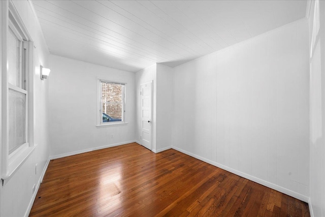 65 Schmeelk Pl, Copiague, NY 11726 - unfurnished room featuring wood finished floors and baseboards