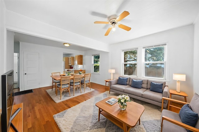 65 Schmeelk Pl, Copiague, NY 11726 - living room with wood finished floors and a ceiling fan