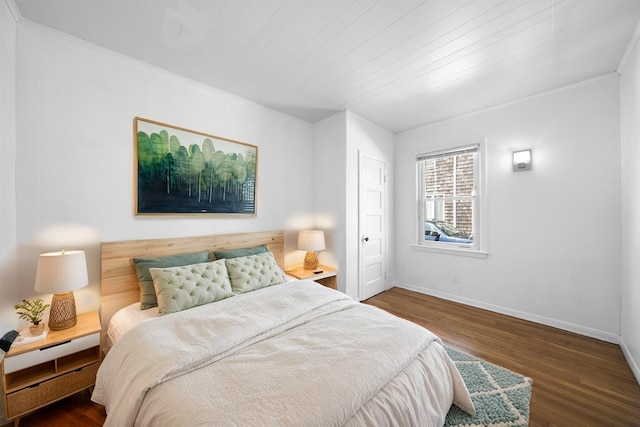 65 Schmeelk Pl, Copiague, NY 11726 - bedroom featuring ornamental molding and dark wood finished floors