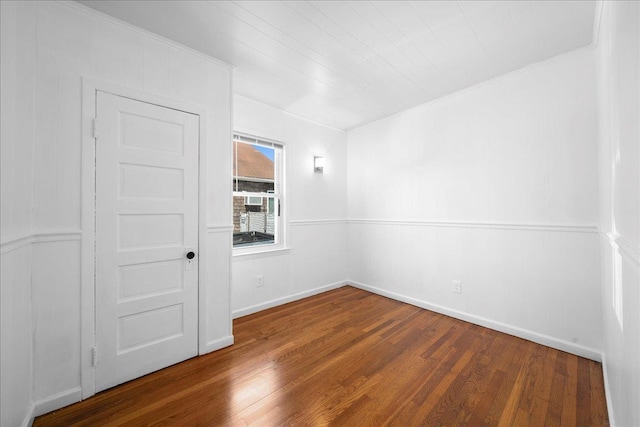 65 Schmeelk Pl, Copiague, NY 11726 - spare room with wood finished floors and baseboards