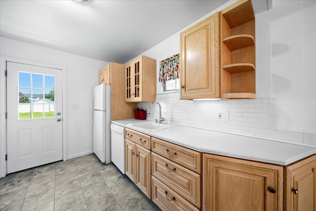 65 Schmeelk Pl, Copiague, NY 11726 - kitchen with white appliances, decorative backsplash, open shelves, light countertops, and glass insert cabinets
