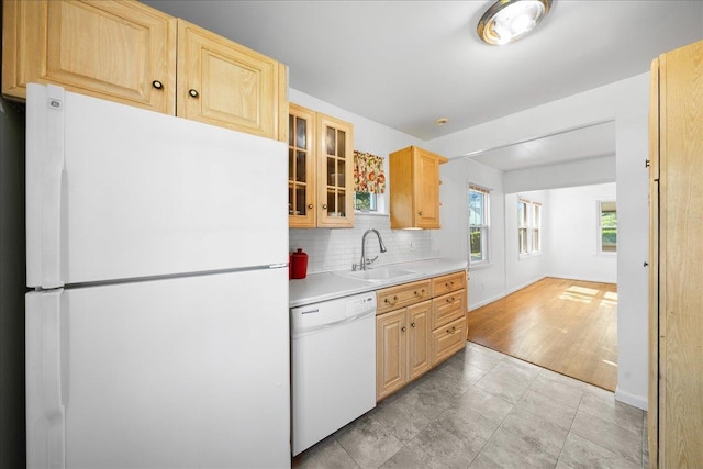 65 Schmeelk Pl, Copiague, NY 11726 - kitchen with white appliances, light brown cabinets, light countertops, glass insert cabinets, and decorative backsplash