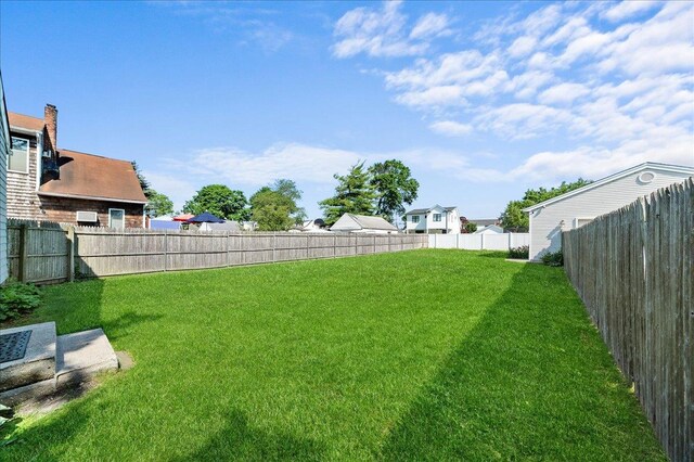 65 Schmeelk Pl, Copiague, NY 11726 - view of fenced backyard