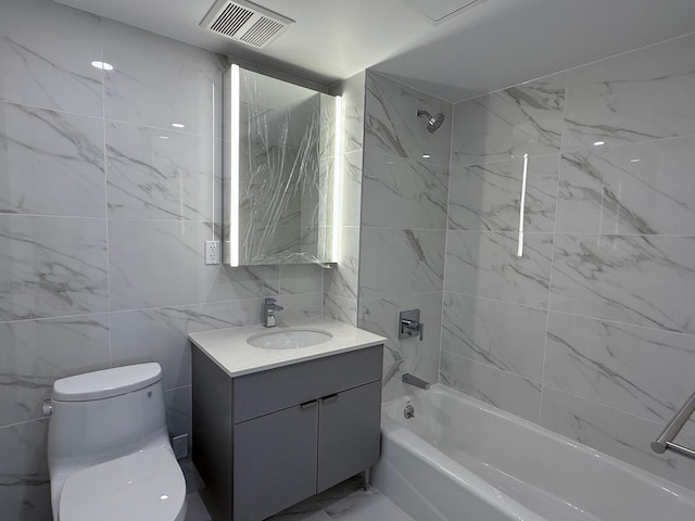 136-80 41st Ave Unit 6G, Flushing, NY 11355 - bathroom with vanity, shower / tub combination, and tile walls