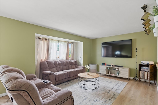 18 Berkeley Ave, Selden, NY 11784 - living room with wood finished floors and baseboards