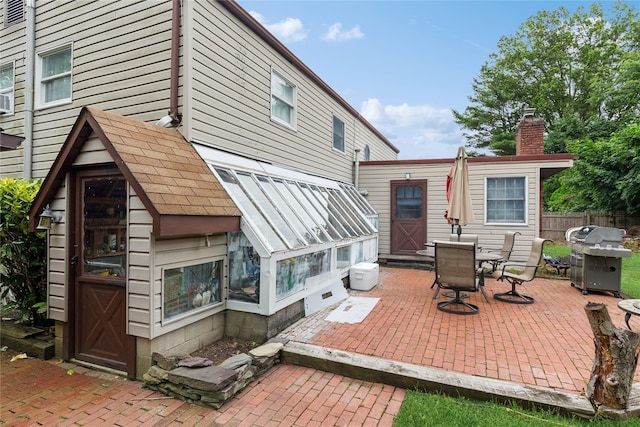 18 Berkeley Ave, Selden, NY 11784 - view of patio featuring a grill and outdoor dining area