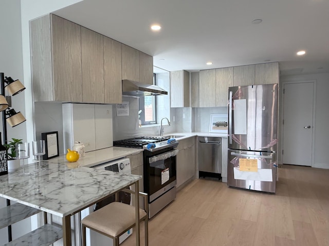 136-80 41st Ave Unit 6H, Flushing, NY 11355 - kitchen featuring appliances with stainless steel finishes, modern cabinets, a peninsula, wall chimney range hood, and recessed lighting