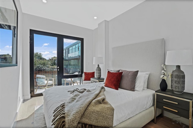 21-31 Shore Blvd Unit 3D, Astoria, NY 11105 - bedroom with dark wood-style floors, access to outside, and recessed lighting