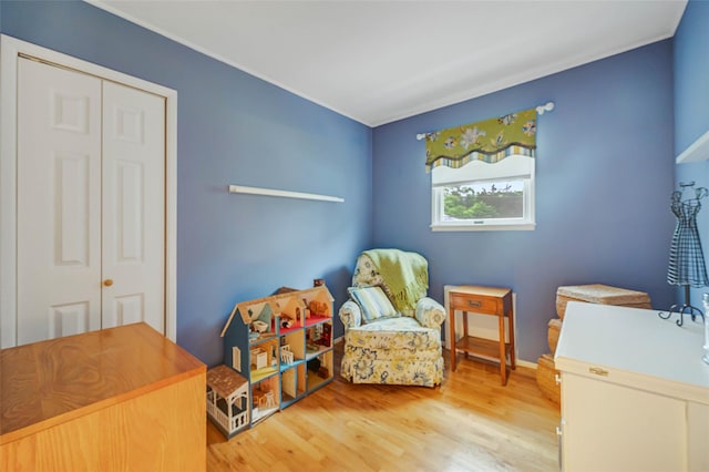 15 Peony Ln, Commack, NY 11725 - living area featuring wood finished floors and crown molding