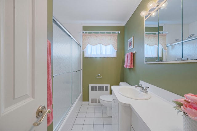 15 Peony Ln, Commack, NY 11725 - full bath featuring radiator heating unit, vanity, tile patterned flooring, and combined bath / shower with glass door