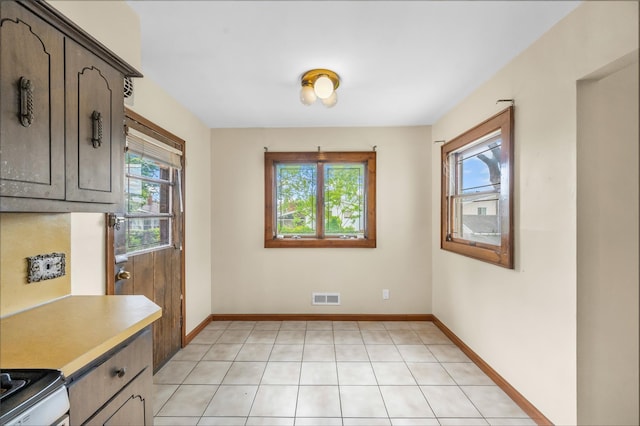 38 W 17th St, Deer Park, NY 11729 - unfurnished dining area with baseboards