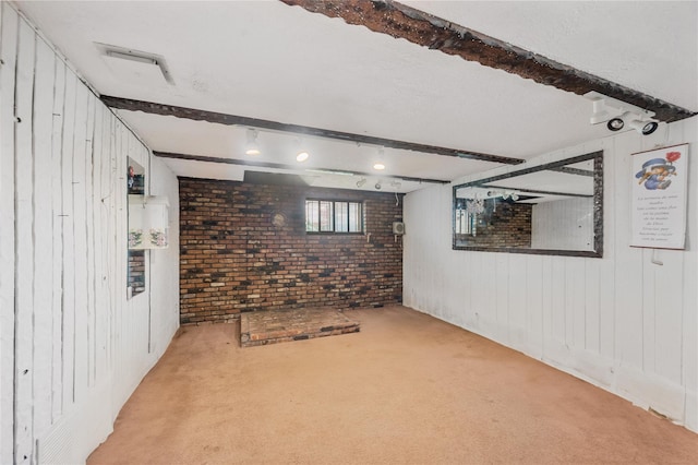 38 W 17th St, Deer Park, NY 11729 - below grade area featuring brick wall, carpet flooring, and wood walls