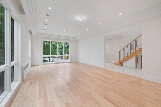 15 Gilda Ct, Spring Valley, NY 10977 - spare room with ornamental molding, stairway, light wood-type flooring, and recessed lighting