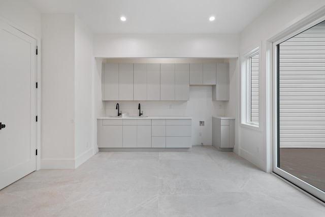 15 Gilda Ct, Spring Valley, NY 10977 - kitchen featuring recessed lighting, modern cabinets, light countertops, and gray cabinetry