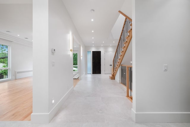 15 Gilda Ct, Spring Valley, NY 10977 - corridor featuring radiator, stairway, and recessed lighting