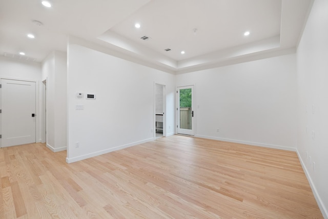 15 Gilda Ct, Spring Valley, NY 10977 - spare room featuring a tray ceiling, light wood finished floors, and recessed lighting