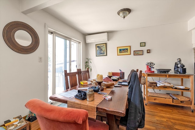 69-28 43rd Ave, Woodside, NY 11377 - dining room with an AC wall unit and wood finished floors