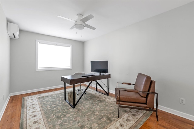 69-28 43rd Ave, Woodside, NY 11377 - office featuring a wall unit AC, ceiling fan, and wood finished floors