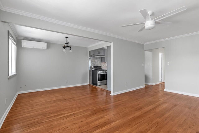 69-28 43rd Ave, Woodside, NY 11377 - unfurnished living room with an AC wall unit, a ceiling fan, a chandelier, light wood-style flooring, and crown molding