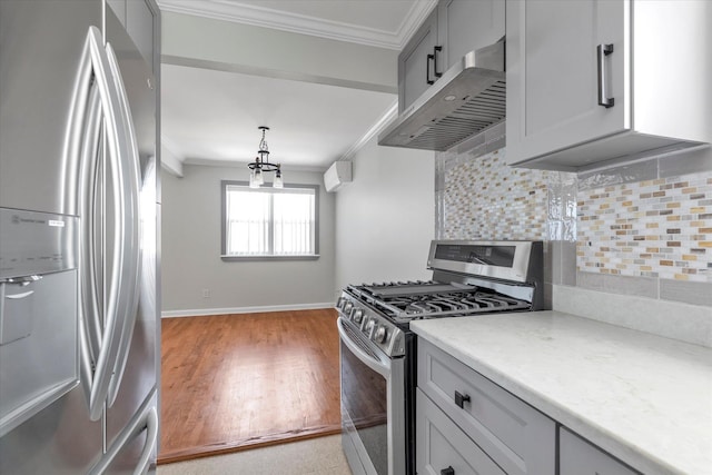 69-28 43rd Ave, Woodside, NY 11377 - kitchen featuring appliances with stainless steel finishes, under cabinet range hood, ornamental molding, tasteful backsplash, and light wood finished floors