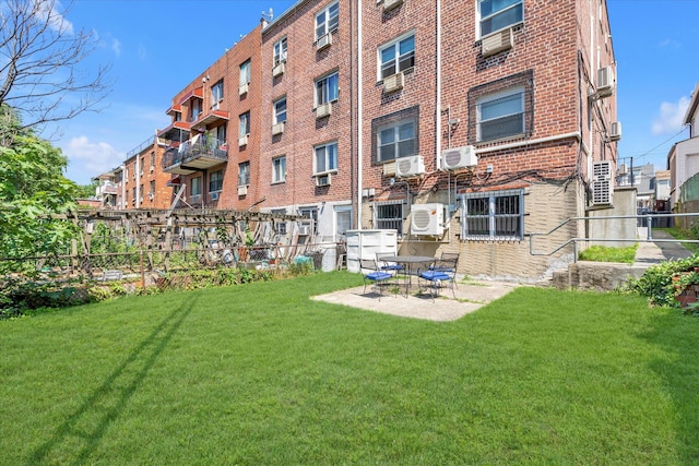 69-28 43rd Ave, Woodside, NY 11377 - rear view of property with brick siding