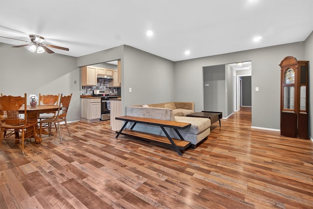 160 New Holland Vlg, Nanuet, NY 10954 - living area featuring light wood-type flooring, ceiling fan, and recessed lighting