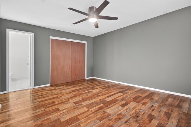 160 New Holland Vlg, Nanuet, NY 10954 - unfurnished bedroom with wood finished floors, a closet, a ceiling fan, and ensuite bath