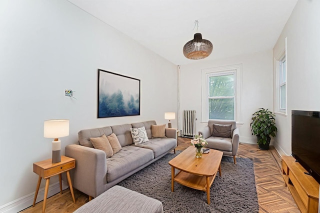 335 E 18th St, Brooklyn, NY 11226 - living area featuring radiator heating unit and baseboards
