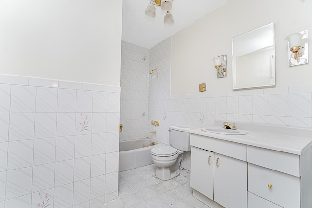 335 E 18th St, Brooklyn, NY 11226 - full bath featuring tile walls, vanity,  shower combination, and tile patterned flooring