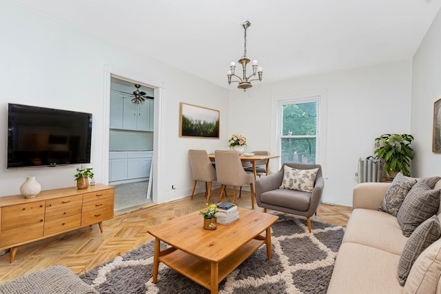 335 E 18th St, Brooklyn, NY 11226 - living room featuring a chandelier, radiator heating unit, and a ceiling fan