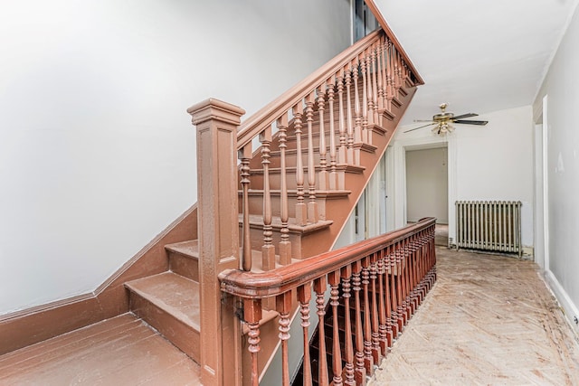 335 E 18th St, Brooklyn, NY 11226 - staircase featuring radiator and ceiling fan