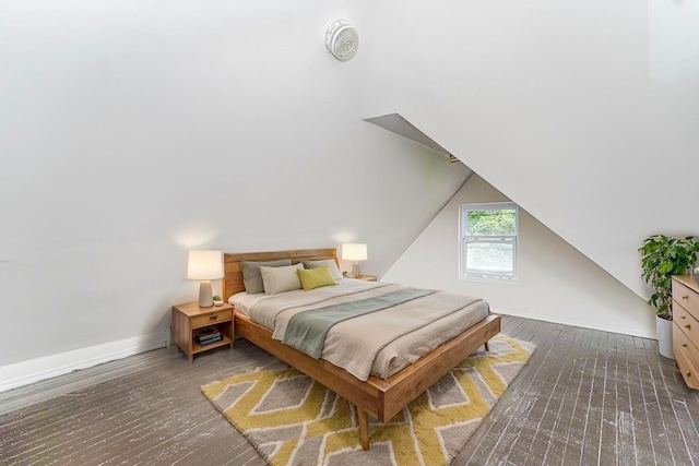 335 E 18th St, Brooklyn, NY 11226 - bedroom with hardwood / wood-style floors and vaulted ceiling