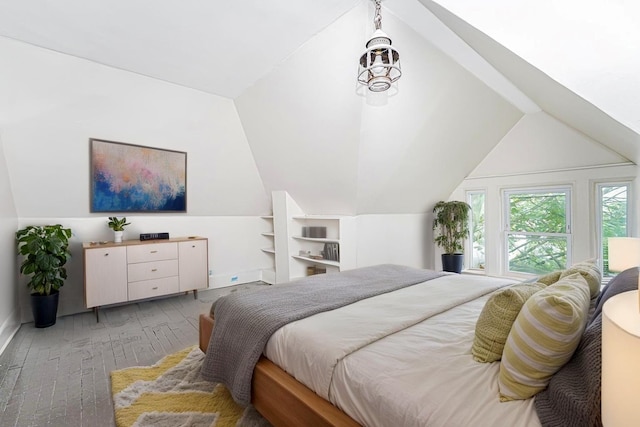 335 E 18th St, Brooklyn, NY 11226 - bedroom with vaulted ceiling and light wood-style floors