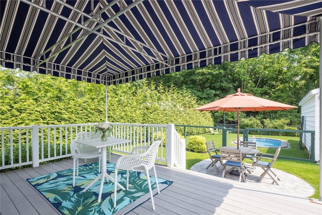 43 Washington Ave, Greenport, NY 11944 - deck with outdoor dining area and a lawn