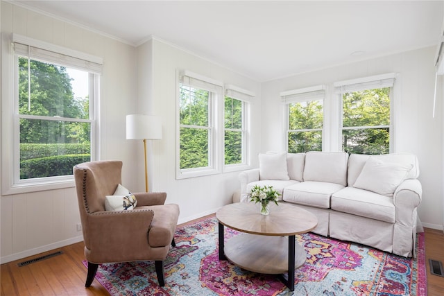 43 Washington Ave, Greenport, NY 11944 - living room featuring ornamental molding and hardwood / wood-style flooring