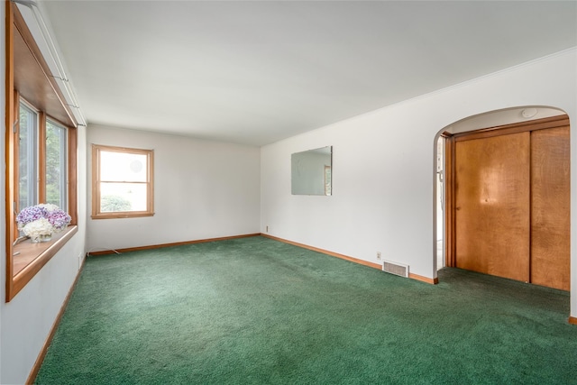 3000 Pequash Ave, Cutchogue, NY 11935 - empty room with carpet and arched walkways