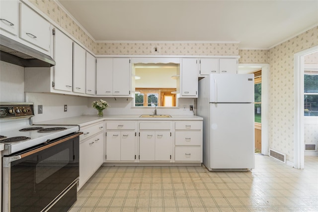 3000 Pequash Ave, Cutchogue, NY 11935 - kitchen featuring white appliances, wallpapered walls, ornamental molding, under cabinet range hood, and light countertops