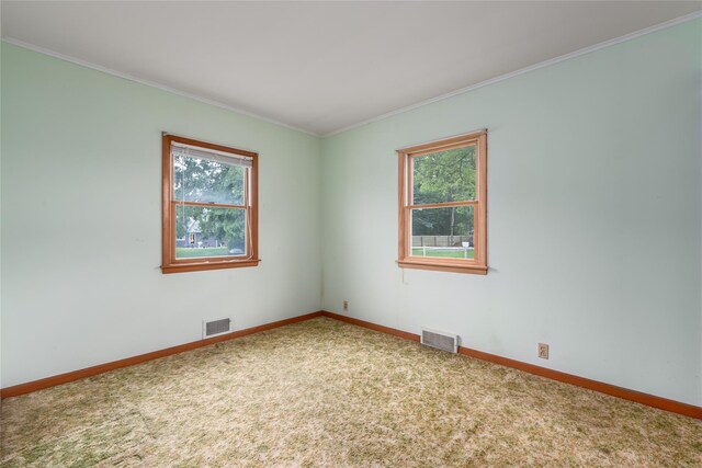 3000 Pequash Ave, Cutchogue, NY 11935 - carpeted spare room featuring healthy amount of natural light and crown molding