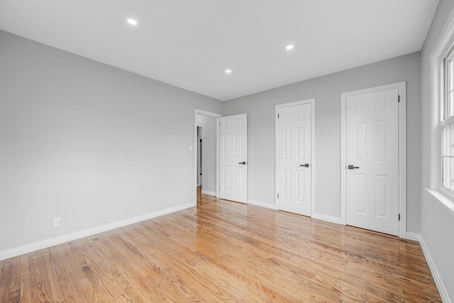 139 Jean Ave, Hempstead, NY 11550 - unfurnished bedroom featuring light wood finished floors and recessed lighting