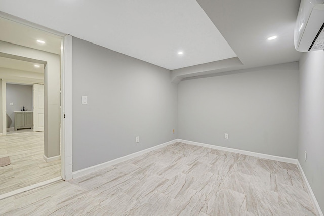 139 Jean Ave, Hempstead, NY 11550 - spare room featuring a wall unit AC and recessed lighting