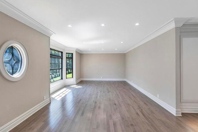 589 Old Bridge Rd, Northport, NY 11768 - spare room featuring ornamental molding, wood finished floors, and recessed lighting
