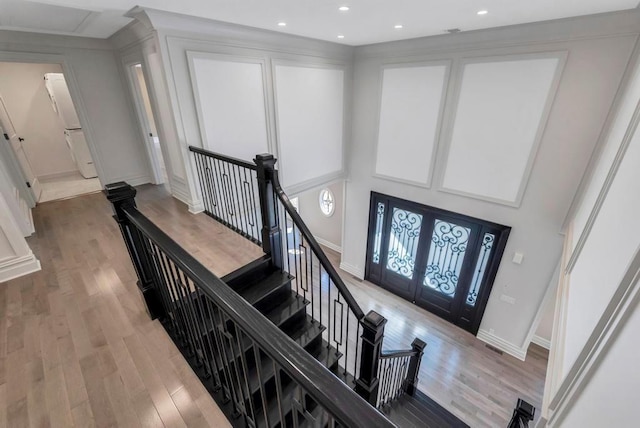 589 Old Bridge Rd, Northport, NY 11768 - stairs with wood finished floors and recessed lighting