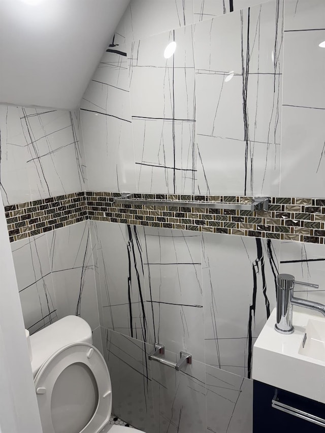4642 Murdock Ave, Bronx, NY 10466 - bathroom with tile walls and vanity