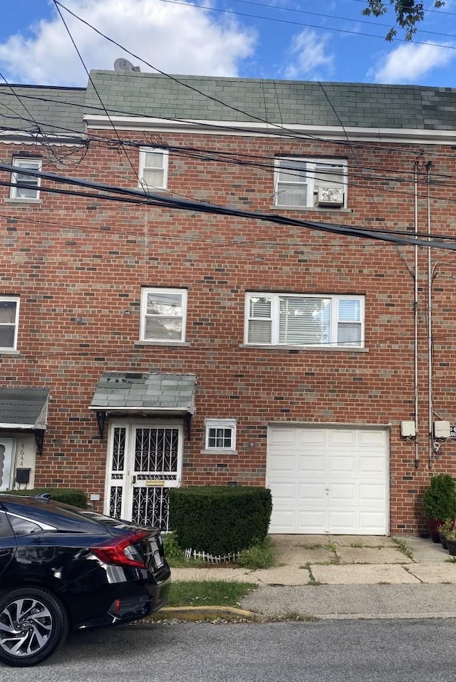 4642 Murdock Ave, Bronx, NY 10466 - view of building exterior with a garage and driveway