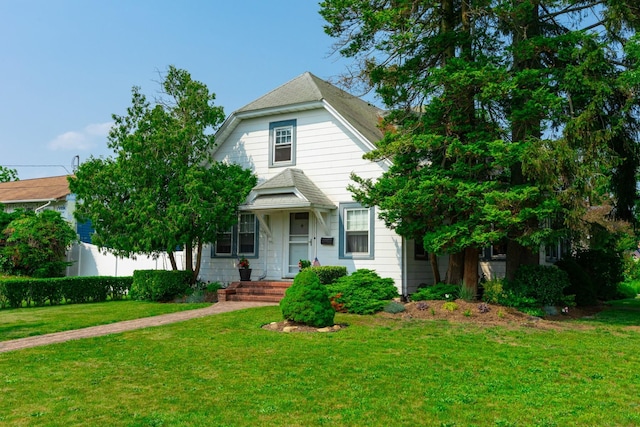 53 Community Rd, Bay Shore, NY 11706 - view of front of house with a front lawn