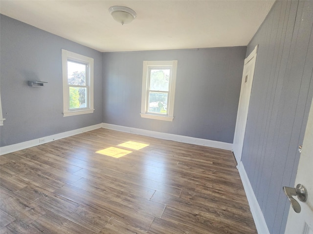 33 Thorne Ave, Hempstead, NY 11550 - spare room with plenty of natural light and wood finished floors