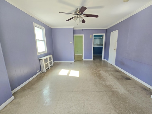 33 Thorne Ave, Hempstead, NY 11550 - empty room featuring ornamental molding, ceiling fan, tile patterned floors, and a smoke detector