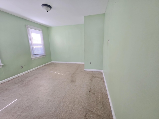 33 Thorne Ave, Hempstead, NY 11550 - spare room featuring baseboards and carpet
