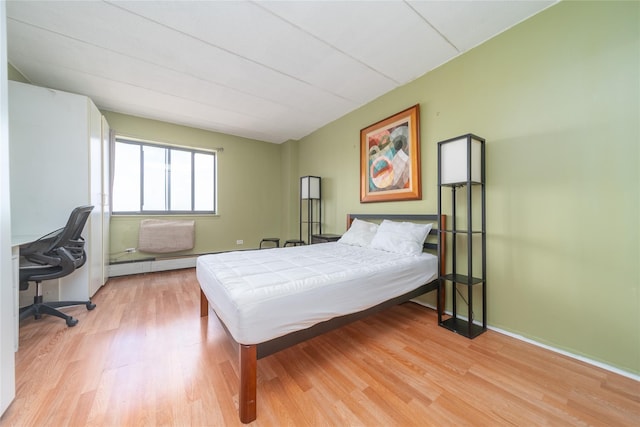92-29 Queens Blvd Unit 14B, Rego Park, NY 11374 - bedroom featuring light wood-style floors and a desk