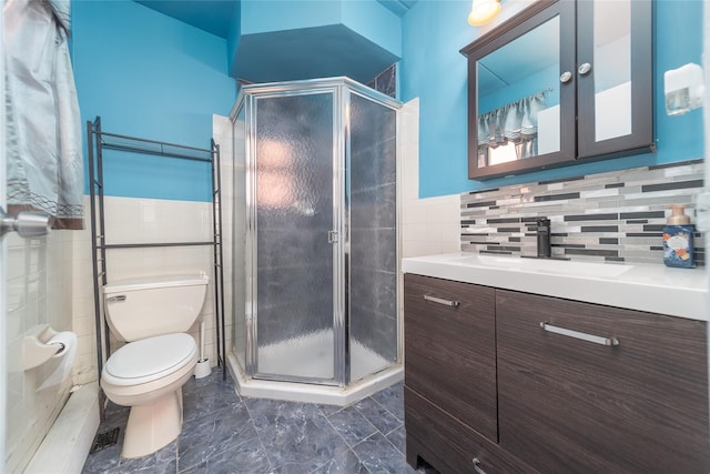 92-29 Queens Blvd Unit 14B, Rego Park, NY 11374 - full bathroom with tile walls, vanity, and a shower stall